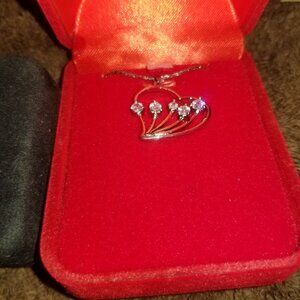 Diamond and silver looking costume jewelry